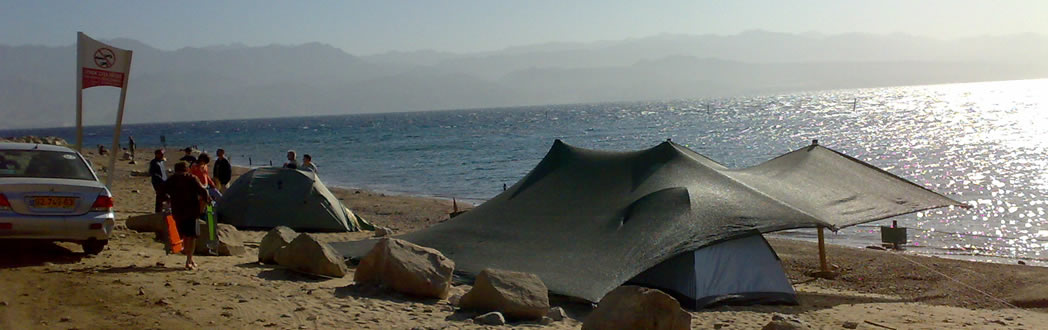 Палатка у моря